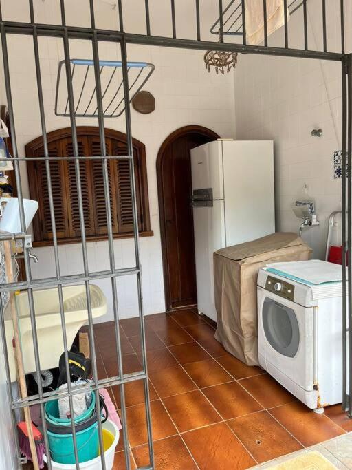 Casa 30 m da praia,condomínio Tenório