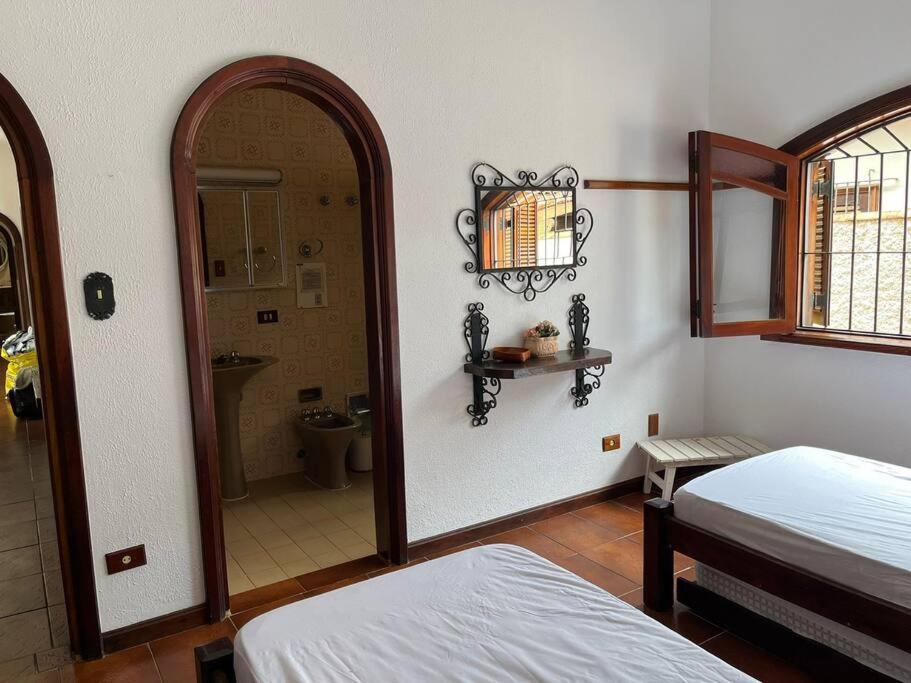 Casa 30 m da praia,condomínio Tenório