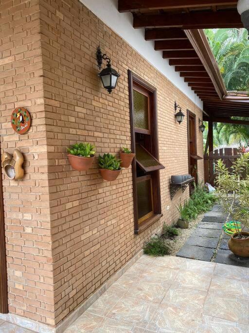 Casa 30 m da praia,condomínio Tenório