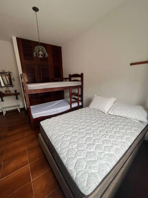 Casa 30 m da praia,condomínio Tenório