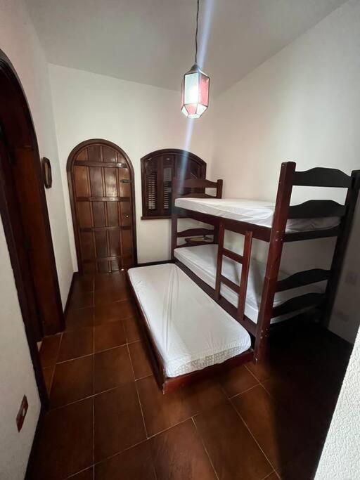 Casa 30 m da praia,condomínio Tenório
