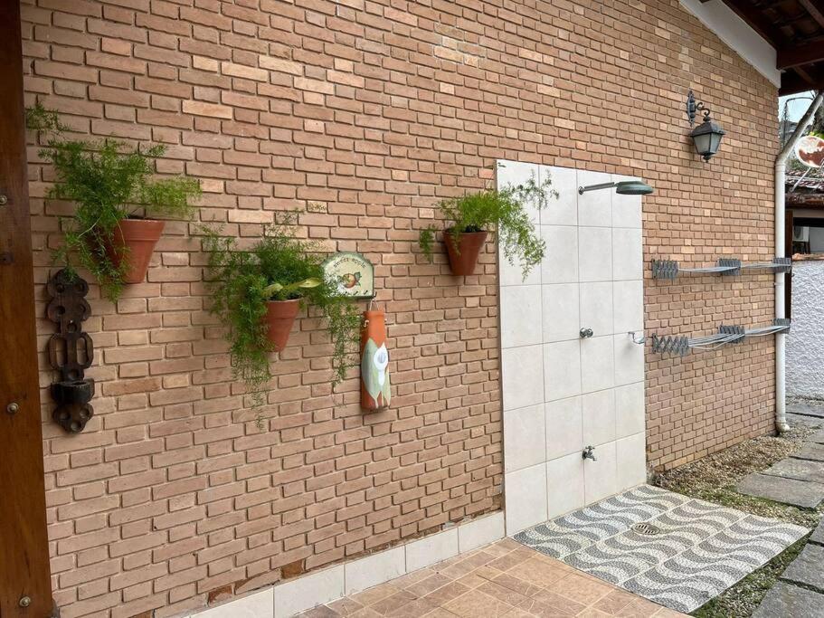 Casa 30 m da praia,condomínio Tenório