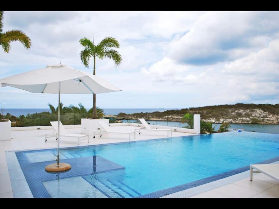 Prachtige bungalow / schitterend uniek uitzicht over baai en oceaan