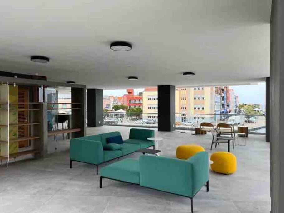 Luxe appartement uitzicht op stad, zee en Handelskade