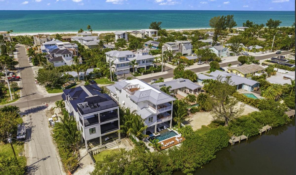 From Dusk 'Til Dune, Gorgeous 5 beds, 5,5 Baths Home on the Canal and steps away from the beach! view 5