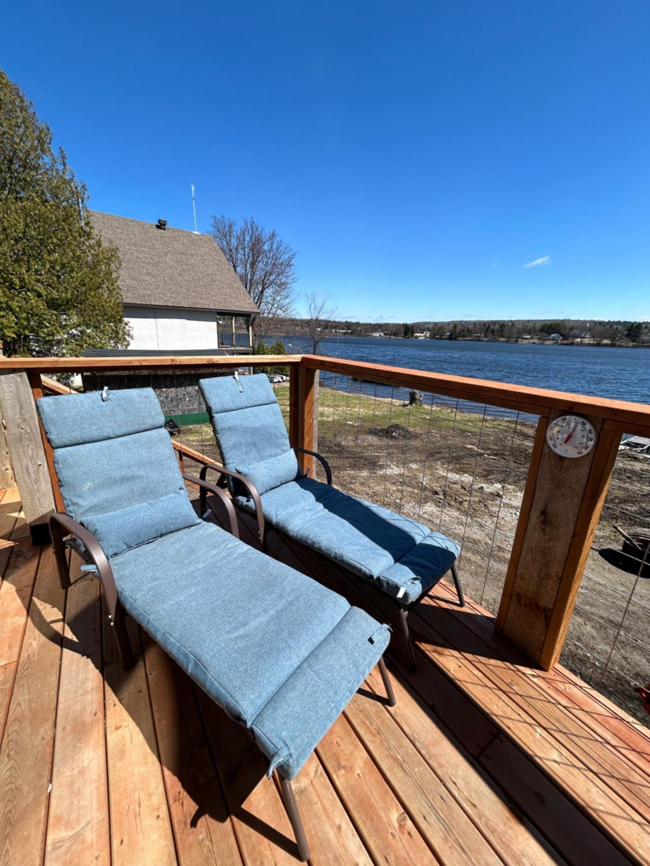 New build, luxurious, 4 plus bedrooms, 2 and a half baths, waterfront chalet, SNOWMOBILE trail access, ample parking & ICE FISHING SHACK