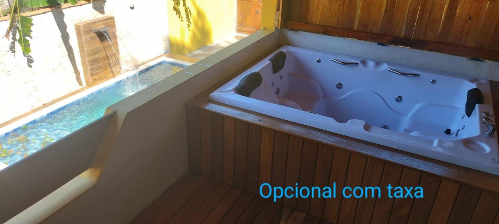 Casa com Jacuzzy aquecida e Piscina, próxima a praia ideal para famílias e casais
