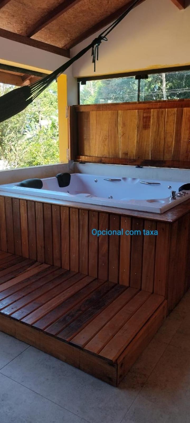 Casa com Jacuzzy aquecida e Piscina, próxima a praia ideal para famílias e casais