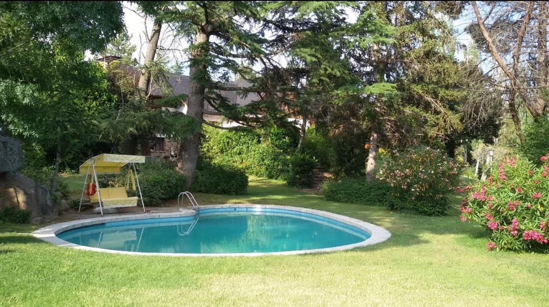 Preciosa cabaña con jardín y barbacoa