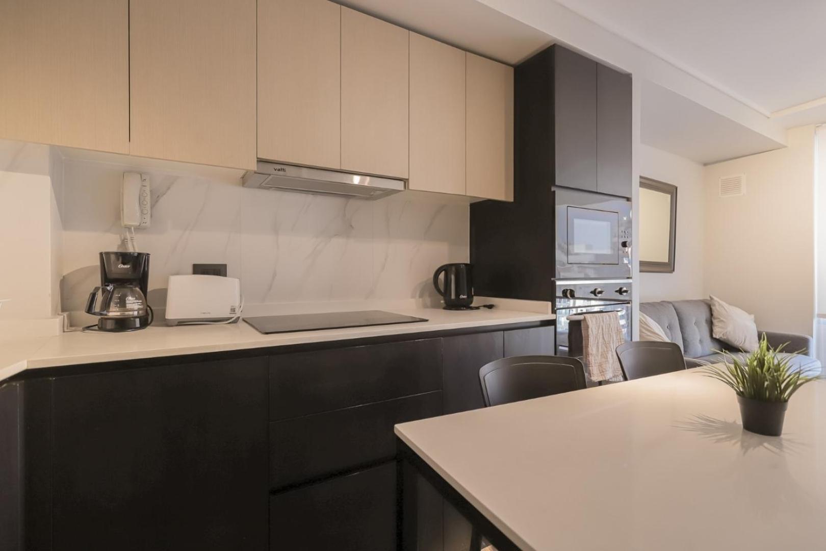 Cozy apartment steps away from Costanera Center