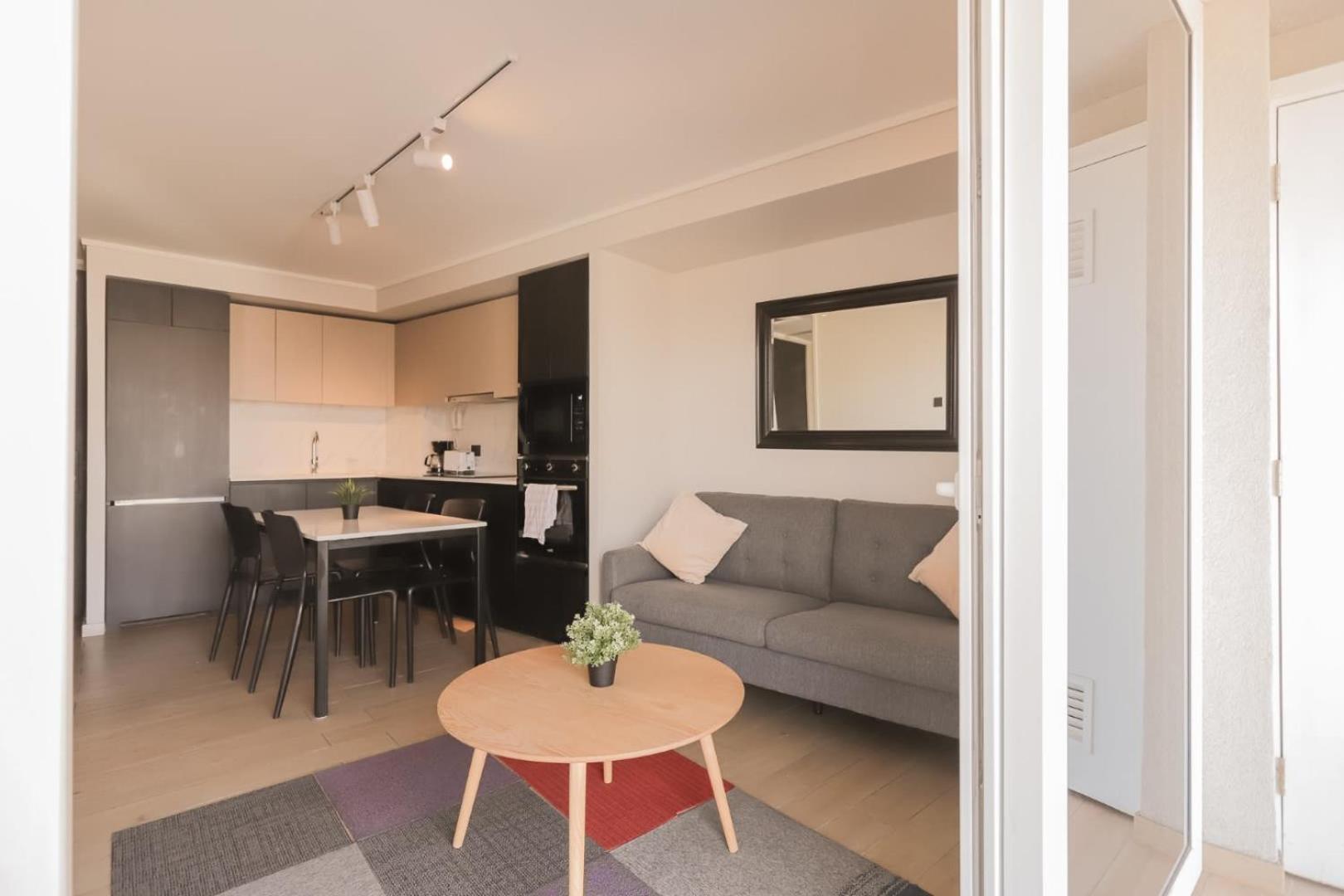 Cozy apartment steps away from Costanera Center