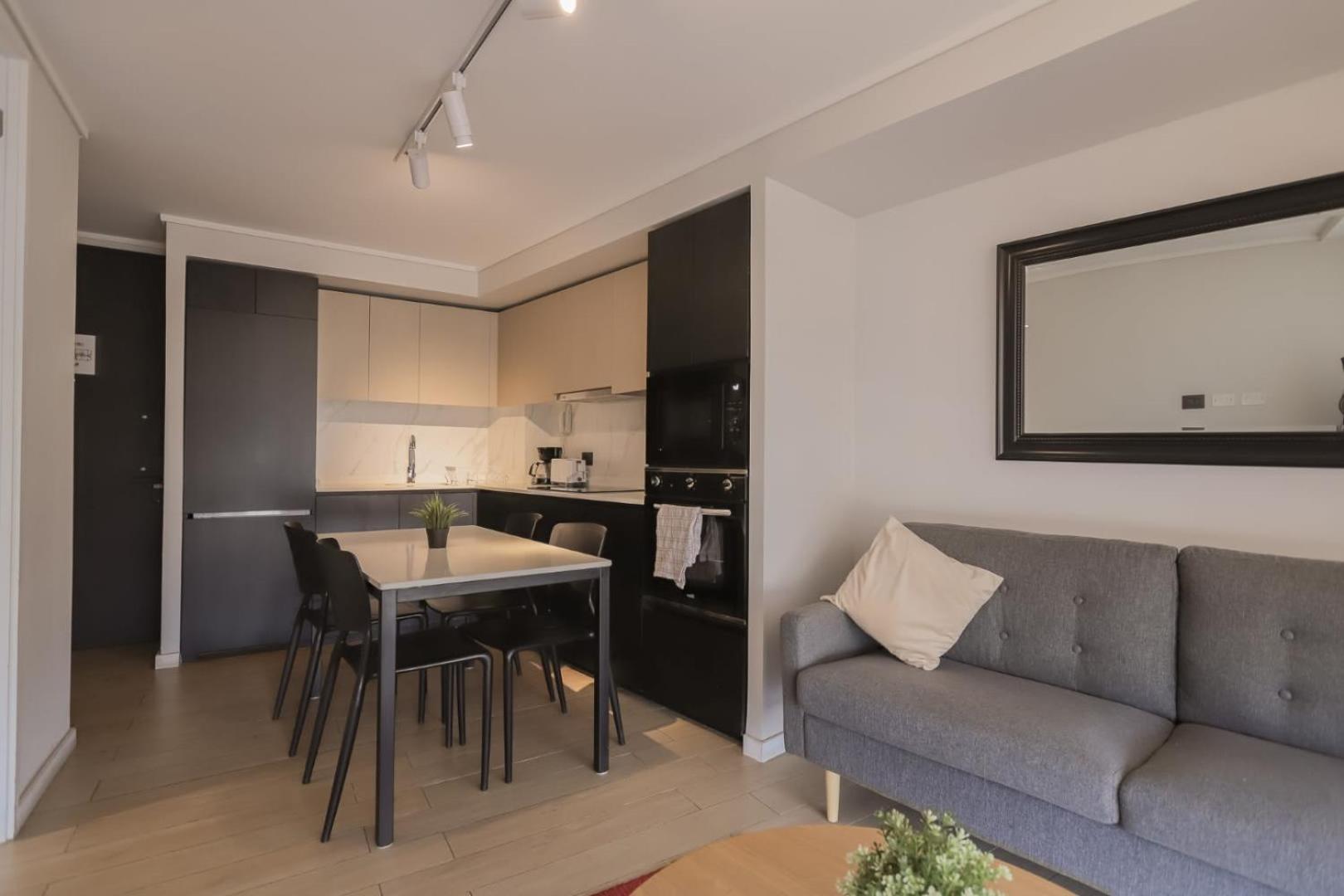 Cozy apartment steps away from Costanera Center