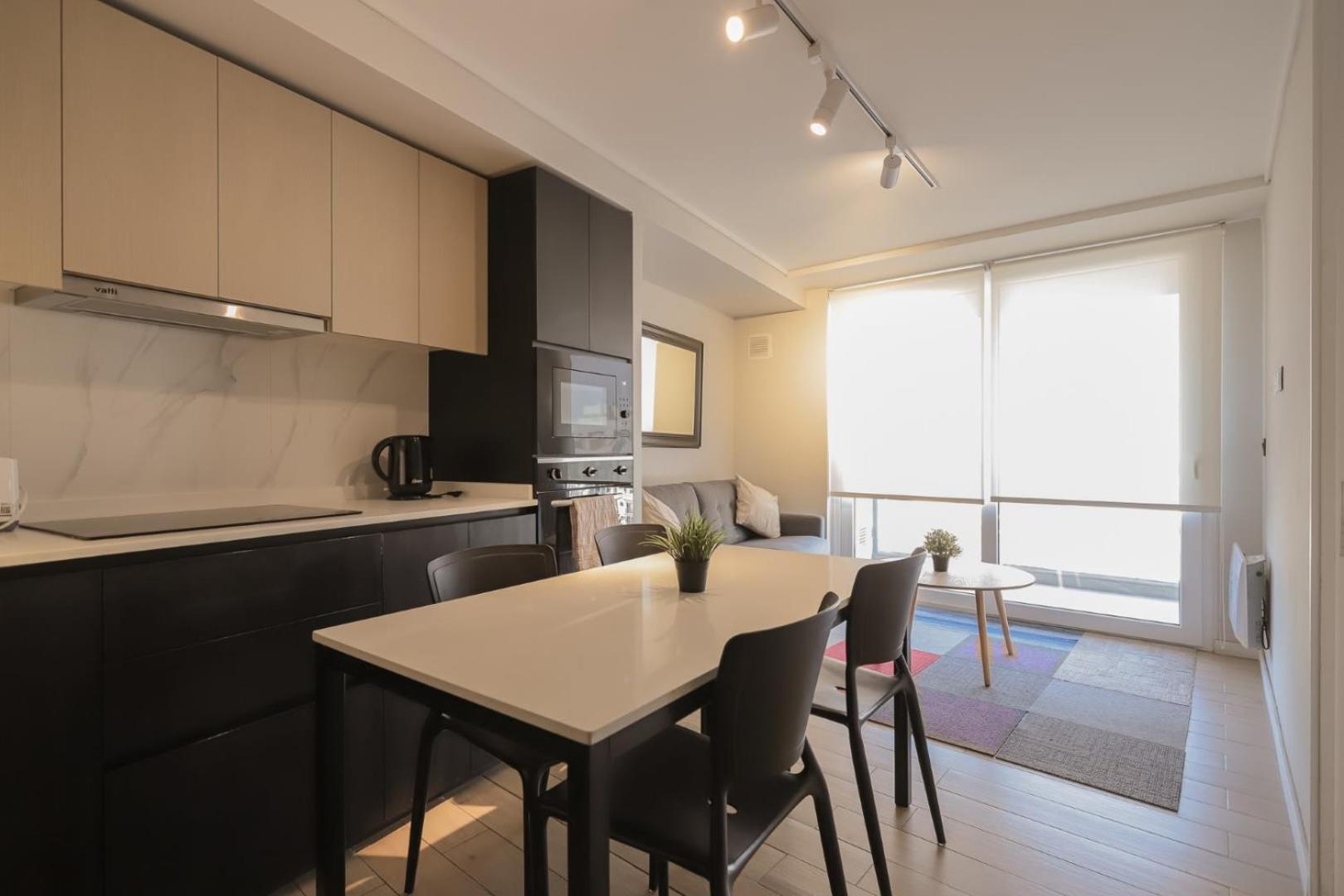 Cozy apartment steps away from Costanera Center