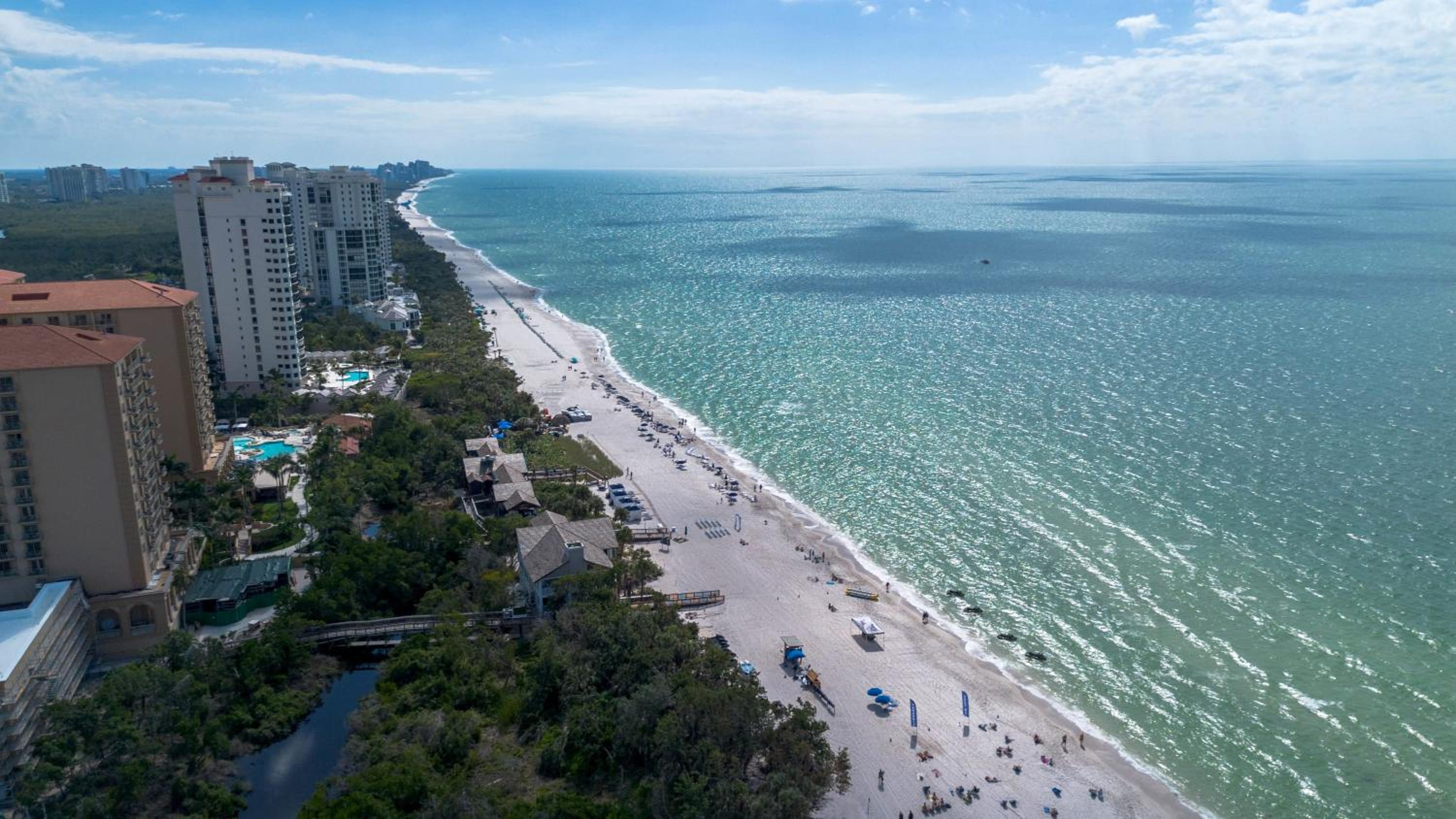 Cozy Condo With Pool Steps From Vanderbilt Beach view 3