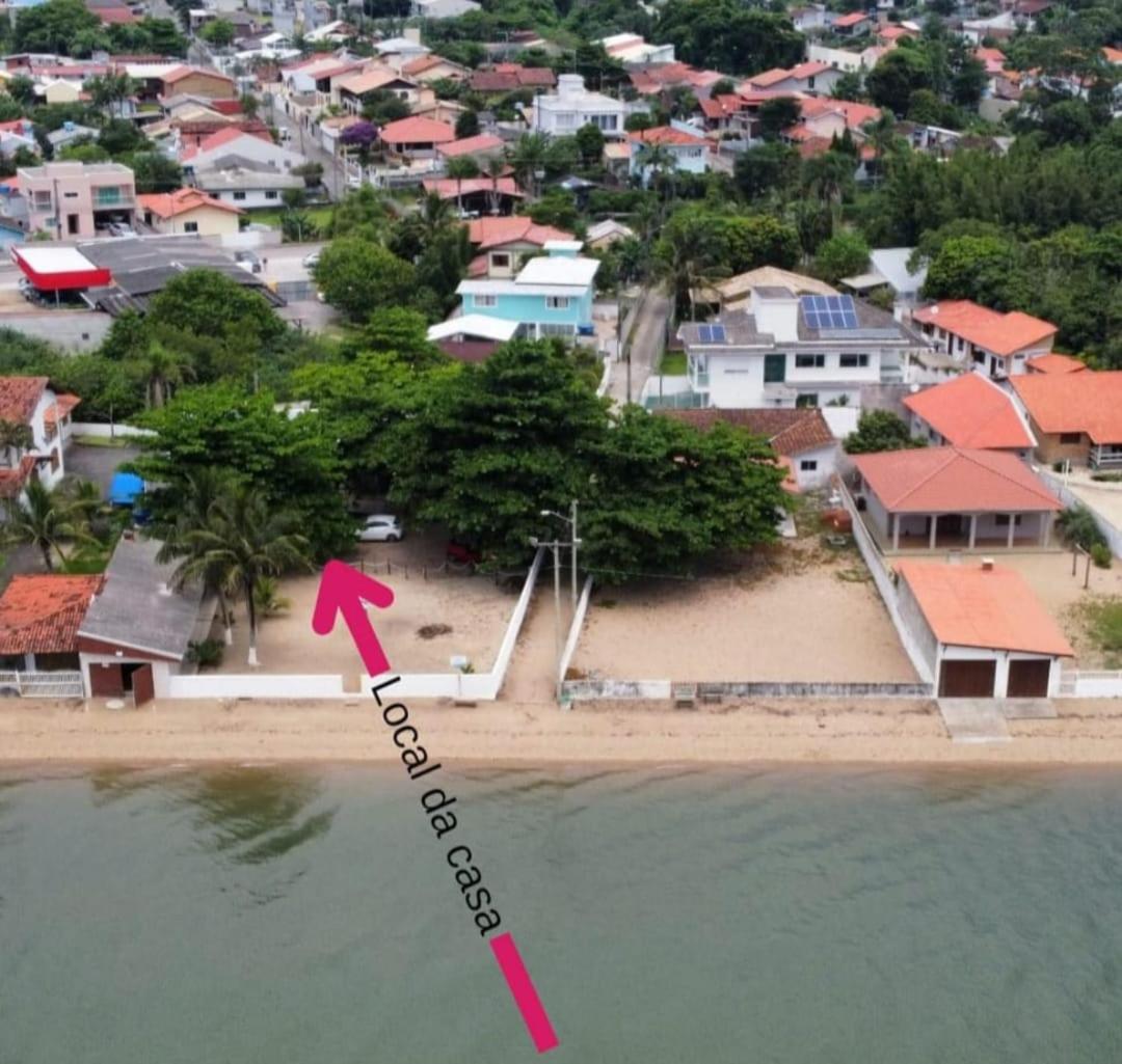 Casa na praia em frente ao mar