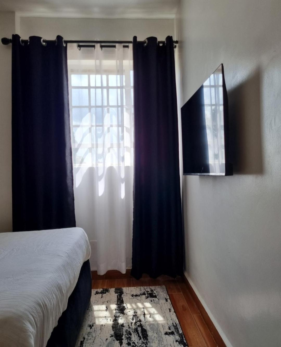 Rossyln Home close to Village Market, UN and Two Rivers Mall