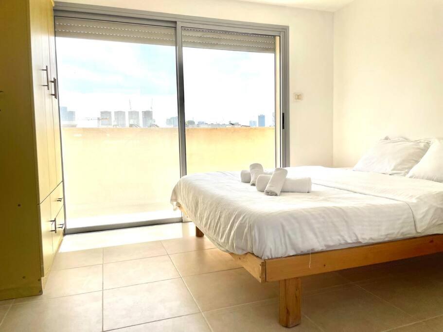 Two Bedrooms Duplex Apartment l Bugrashov Street l by Bookiz view 3