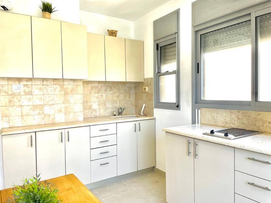 Two Bedrooms Duplex Apartment l Bugrashov Street l by Bookiz view 5