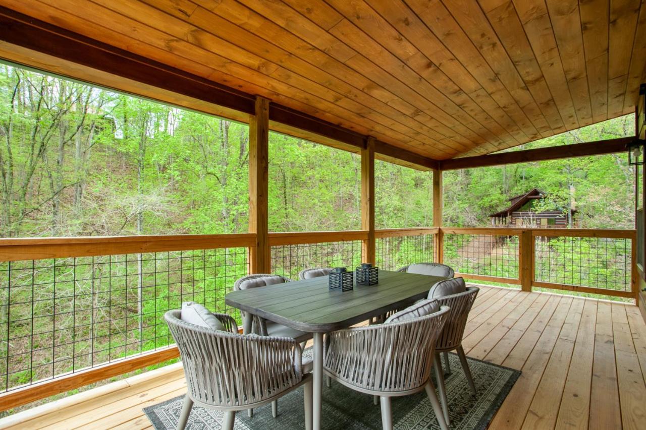 Allure Woods View HotTub Outdoor Dining Games view 3