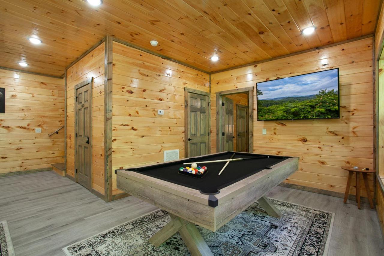 Allure Woods View HotTub Outdoor Dining Games view 5