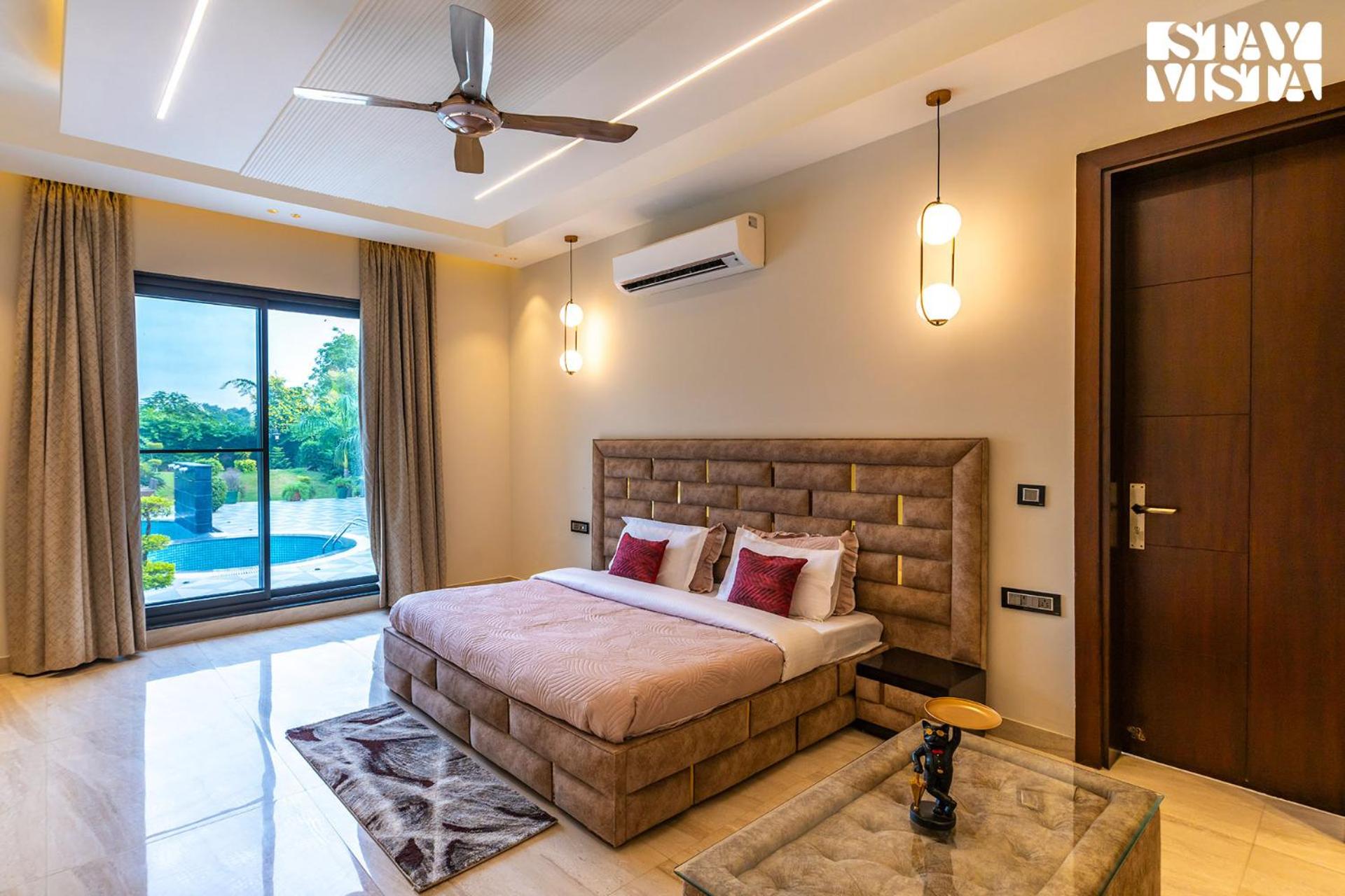 StayVista's Hampton Acres - Outdoor Pool, Vast Lawn & Terrace view 3