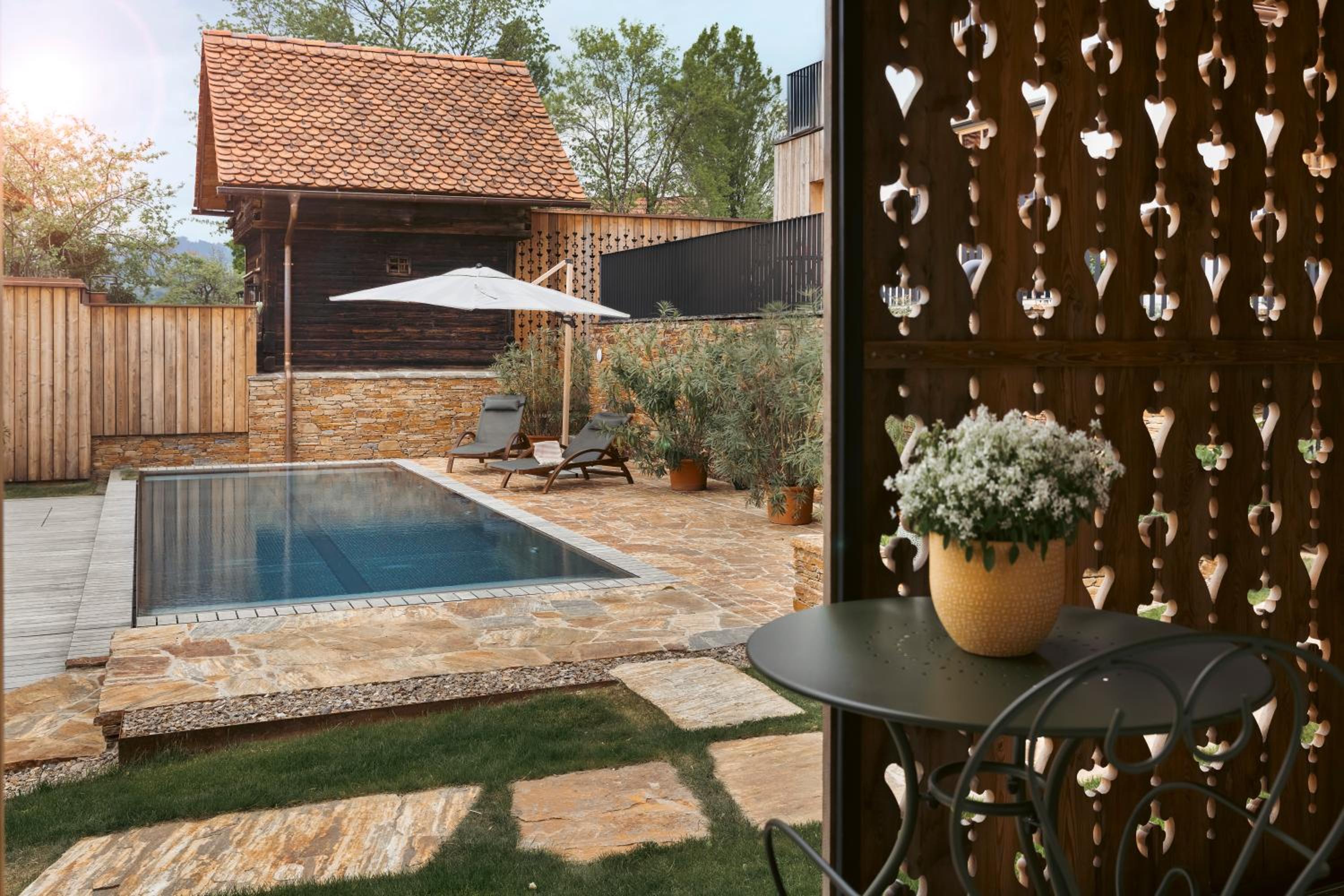 Am Wildbachberg - Luxus Ferienhäuser mit Infinitypool, Privatsauna und Weinkeller