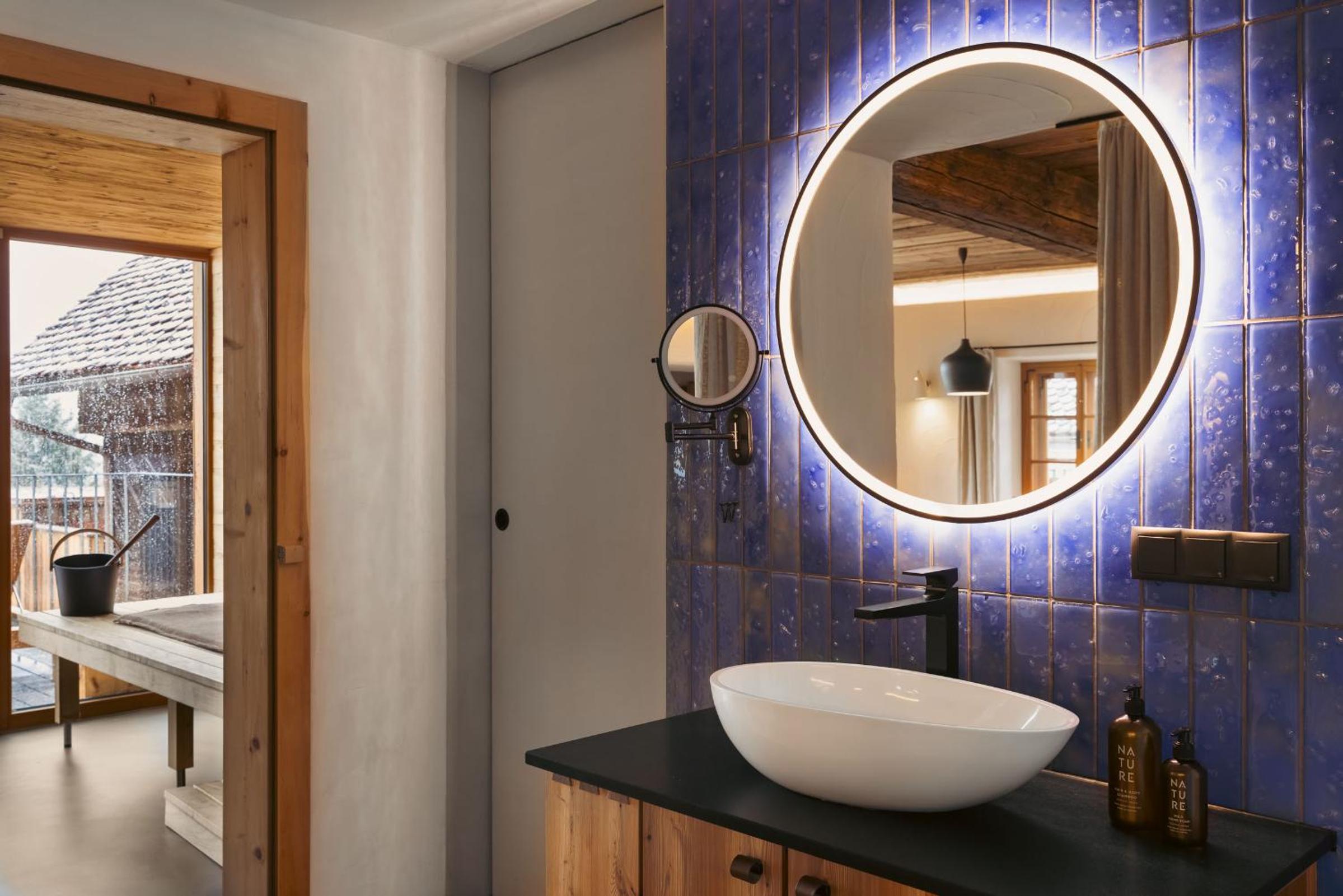 Am Wildbachberg - Luxus Ferienhäuser mit Infinitypool, Privatsauna und Weinkeller