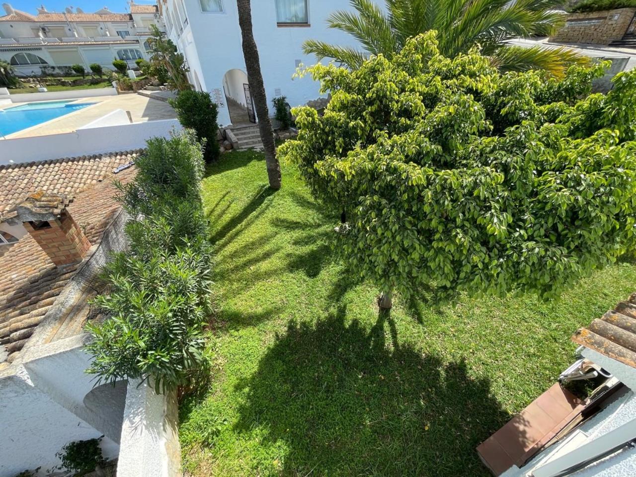 Adosado en urbanización con piscina y magnificas vistas a Denia