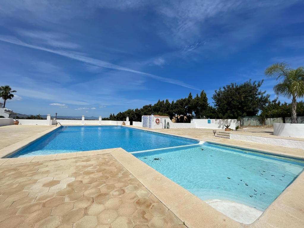 Adosado en urbanización con piscina y magnificas vistas a Denia