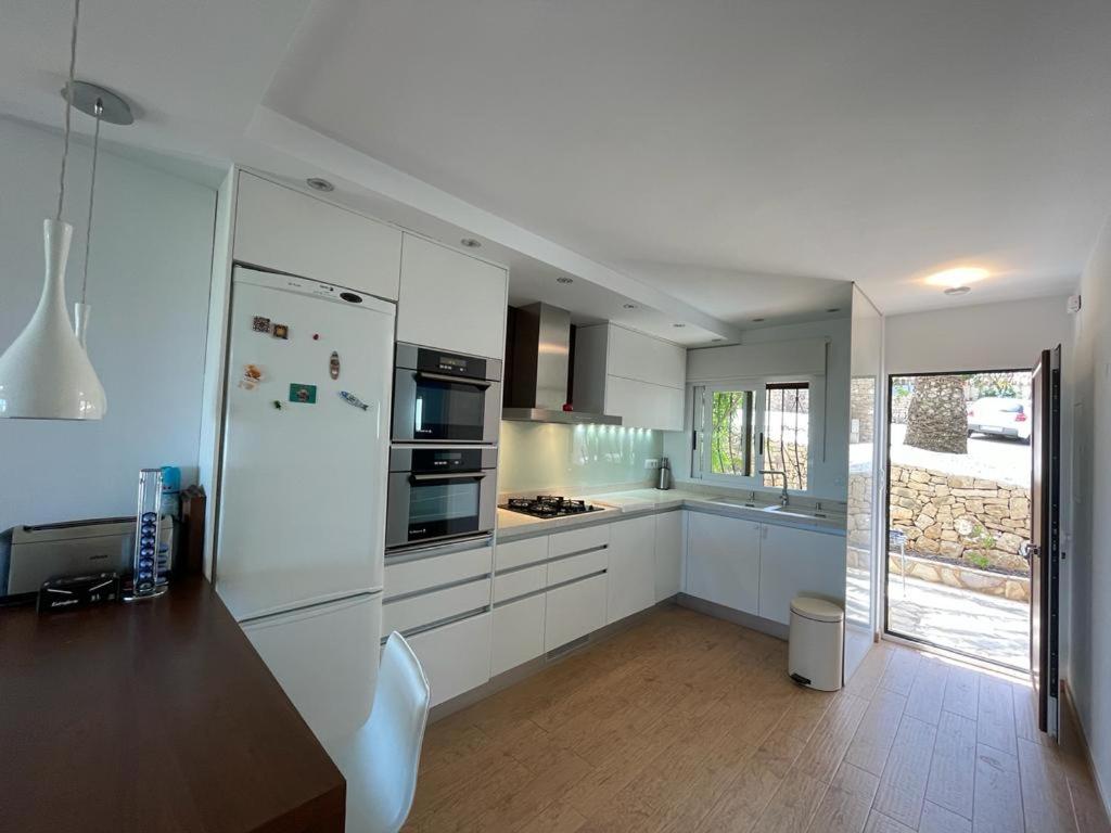 Adosado en urbanización con piscina y magnificas vistas a Denia