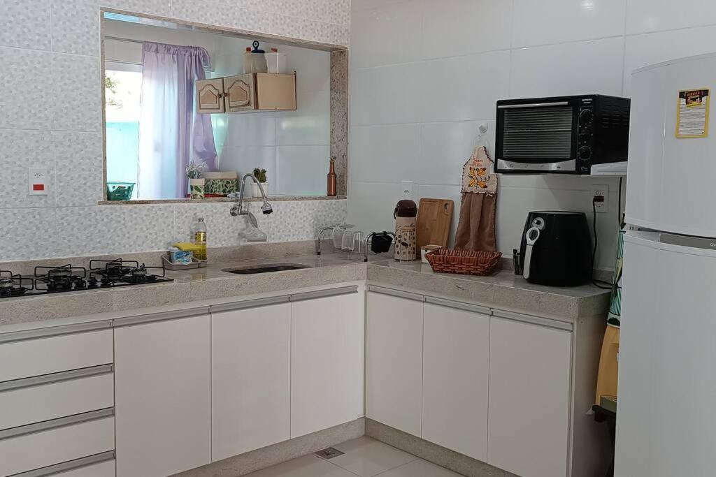 Casa em Unamar com piscina privativa