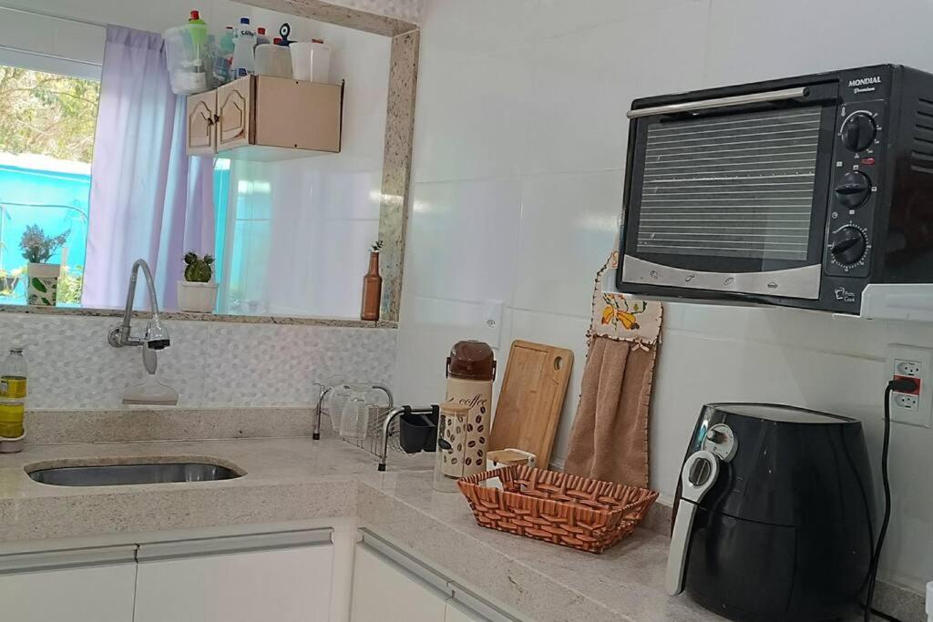 Casa em Unamar com piscina privativa