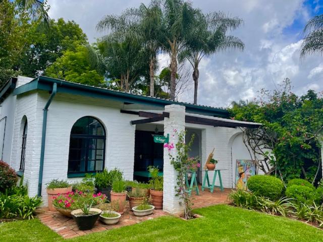 Cottage in a beautiful South African garden view 5
