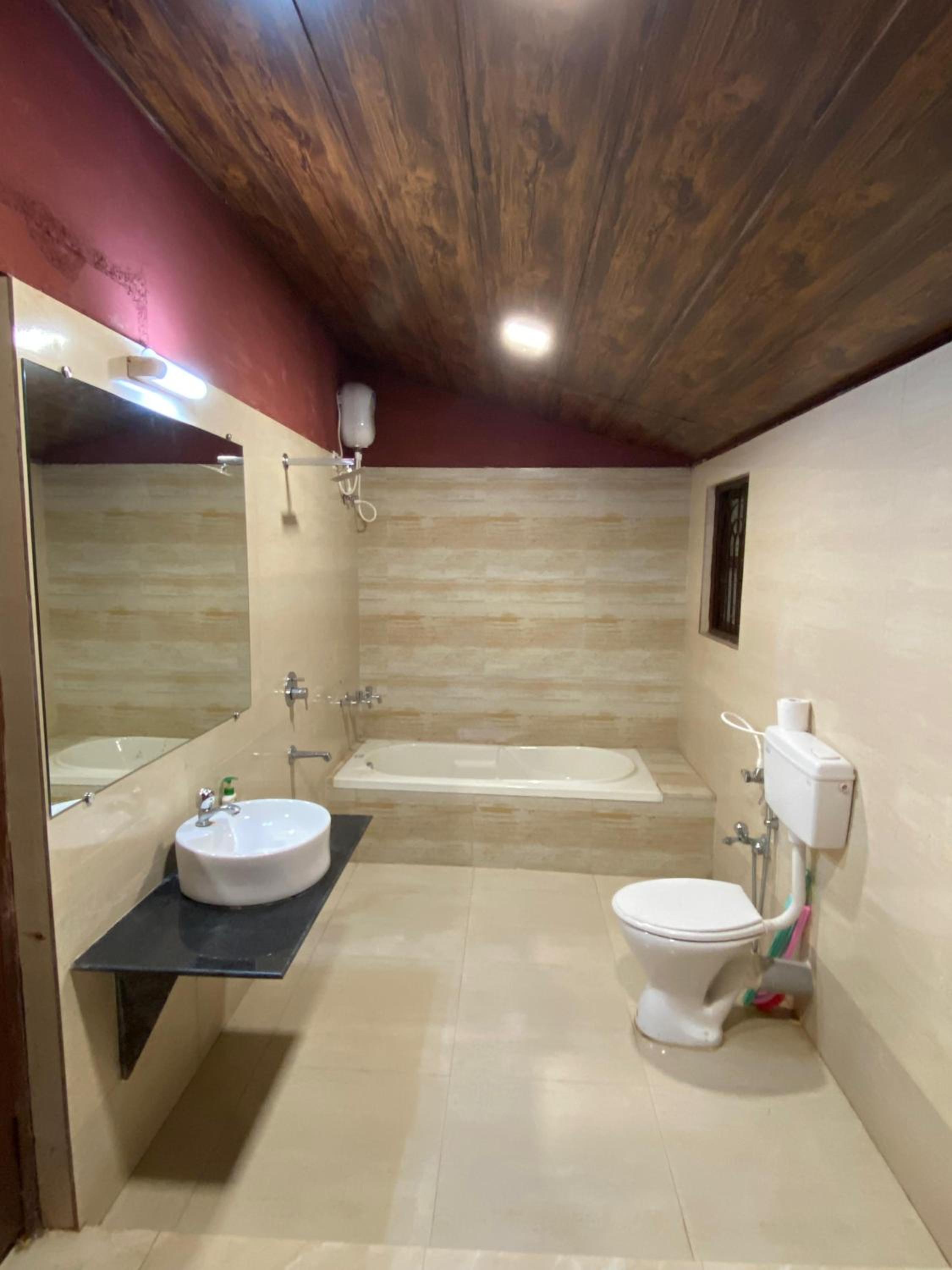 The Mango Woods Cottage with Bathtub in Alibag with Swimming Pool