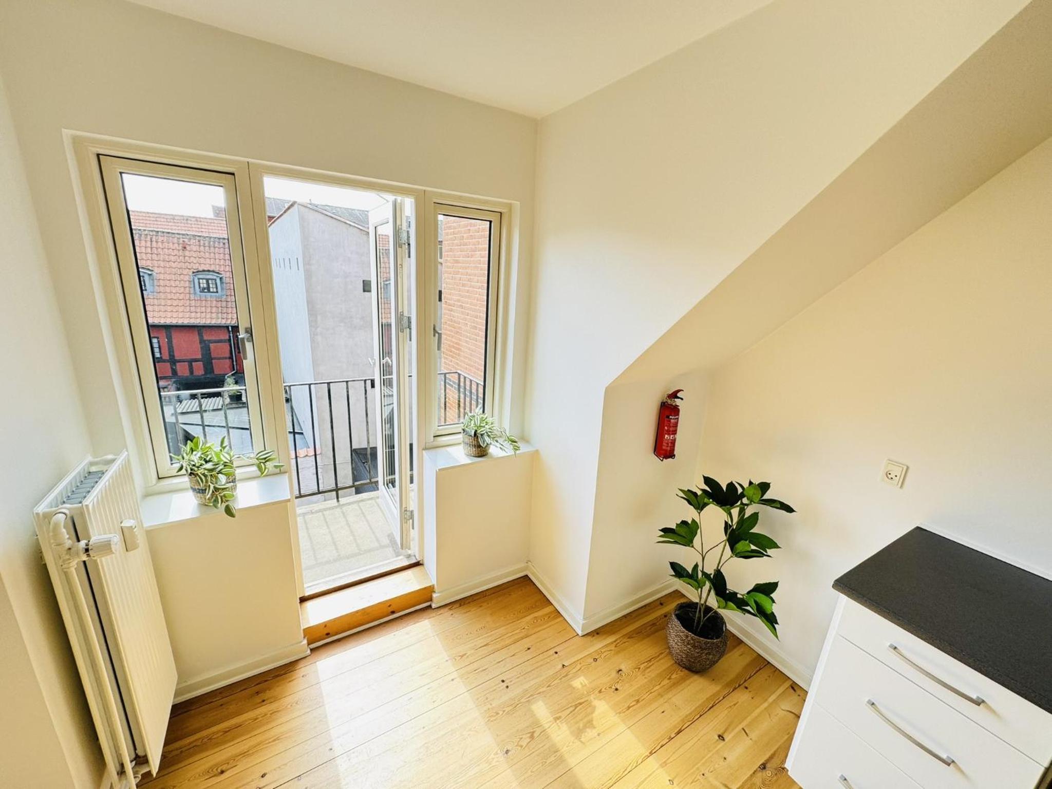 aday - 1 bedroom balcony apartment on the pedestrian street in Randers