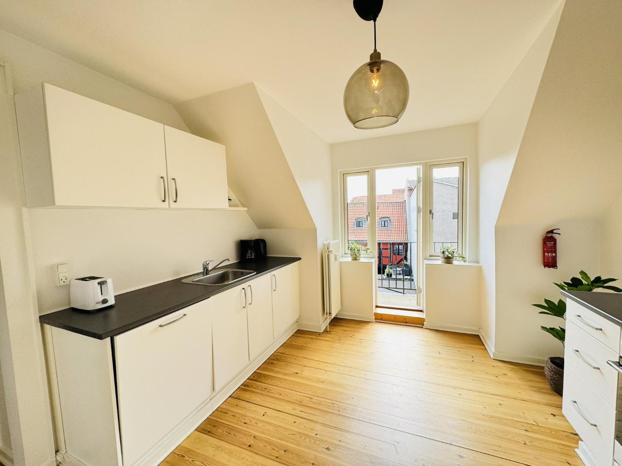 aday - 1 bedroom balcony apartment on the pedestrian street in Randers