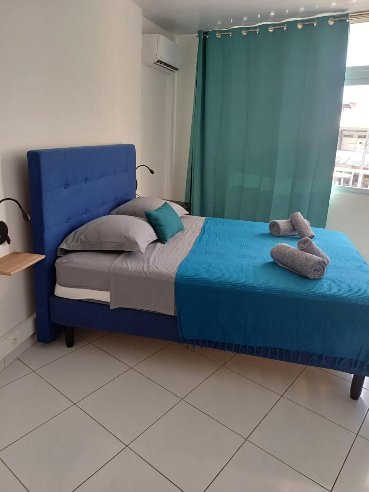 Photo 13 sur 34 de DREAMLINER - City center room Papeete