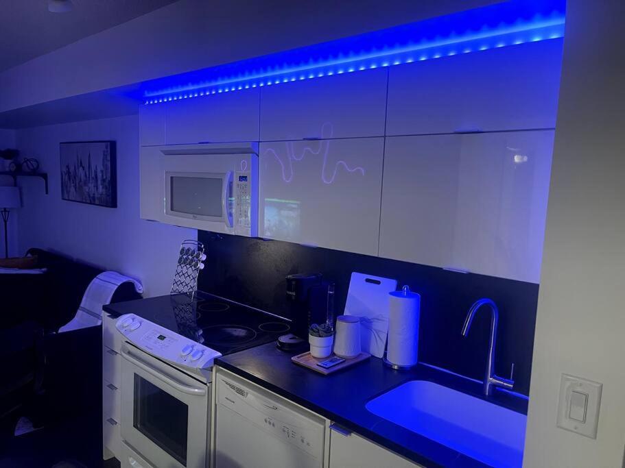 SkyHigh Haven LED-Lit Downtown Condo Retreat