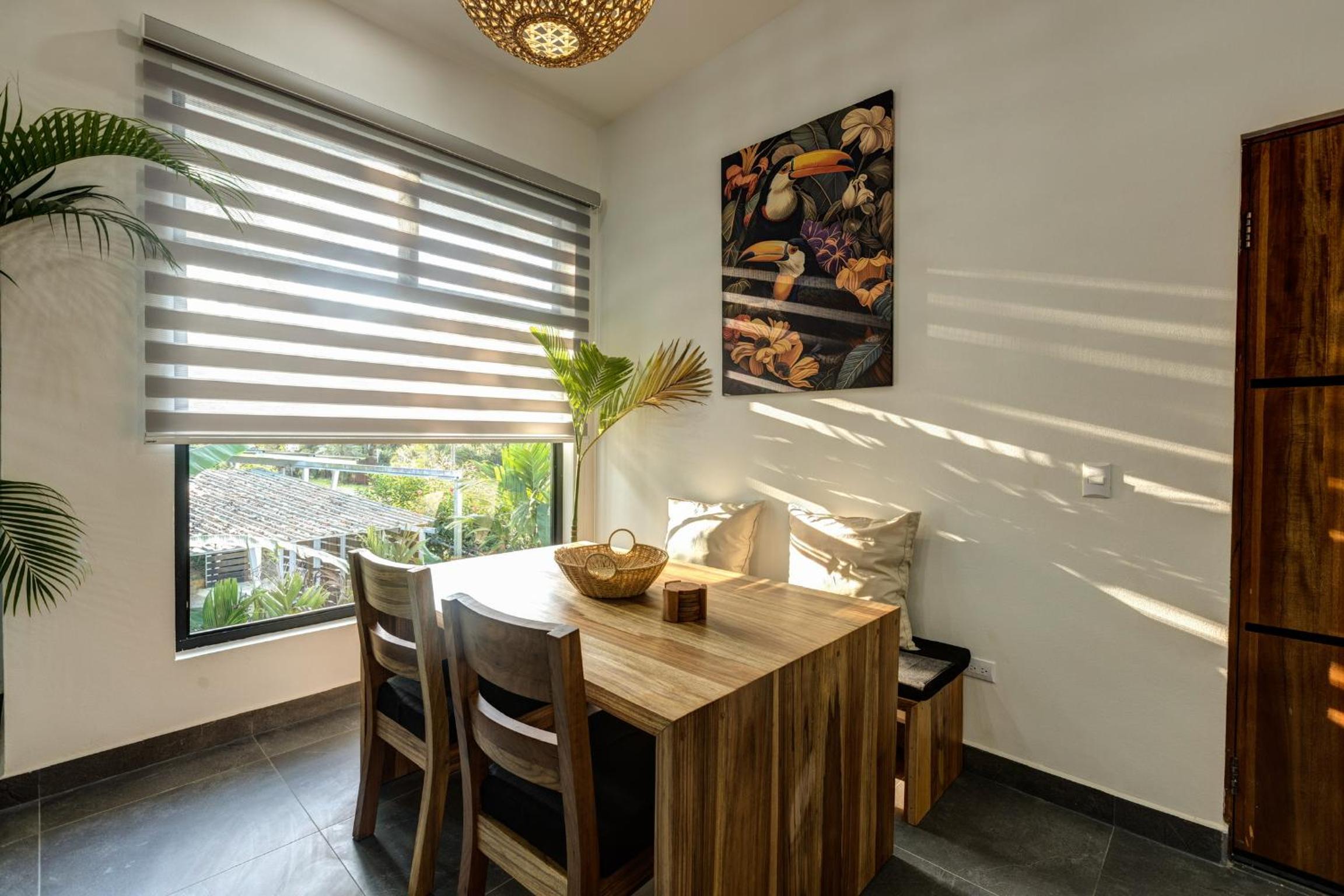 Casa Toucan 2 bedroom 2 bath includes AC in house a shared gym and infinity pool and 5 min walk to the beach