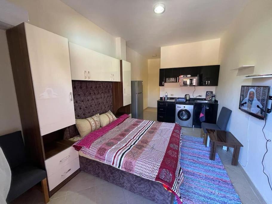 Lovely Studio with a Balcony on the Second Floor with Pool View & Free Pool Access view 3
