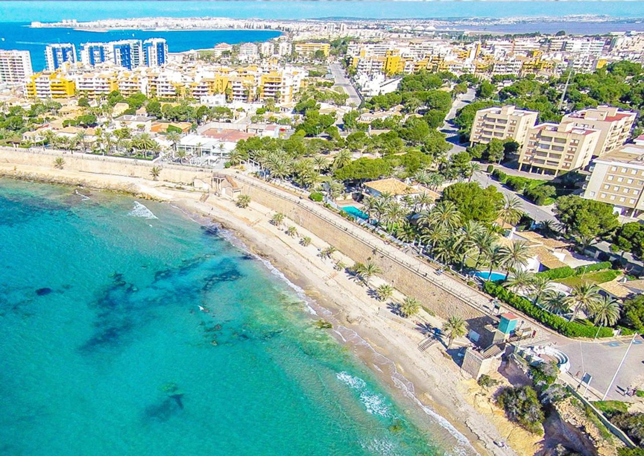 Peaceful Apartment with Sea & Nature Views, Terrace, Pool and Garage
