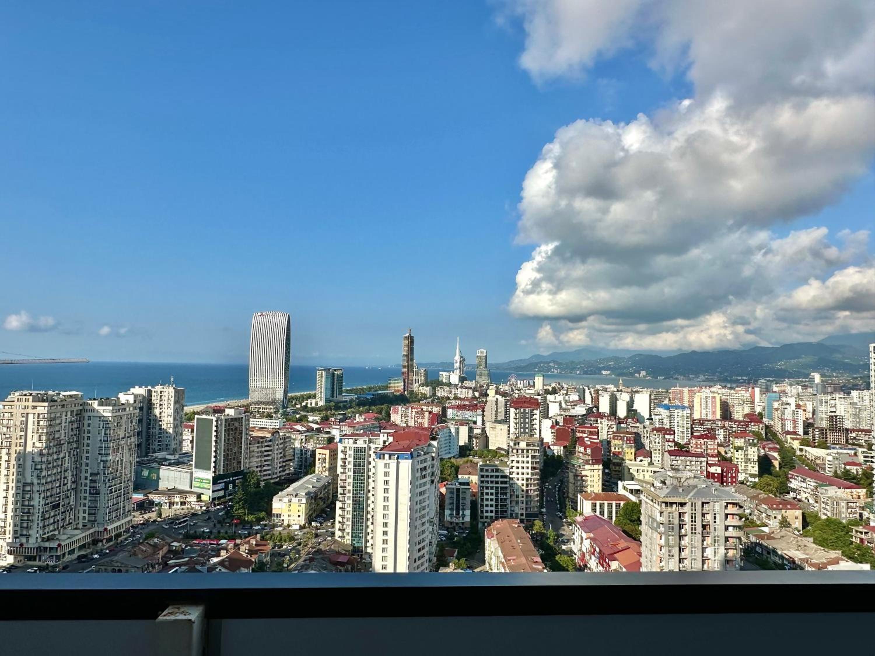 Panoramic views of the sea, mountains and city view 4