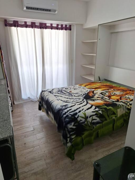 Monoambiente con balcón