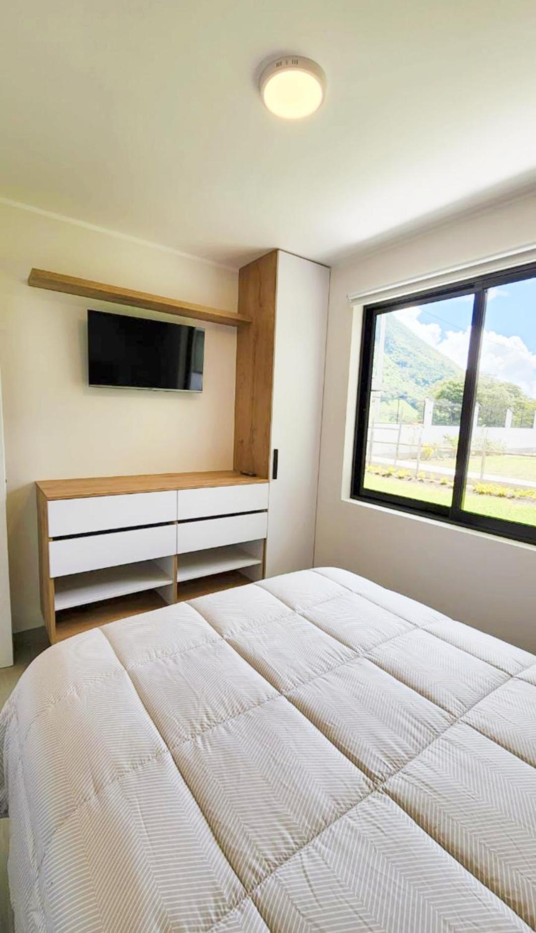 HAWER apartments Oxapampa, vista al valle con cocina