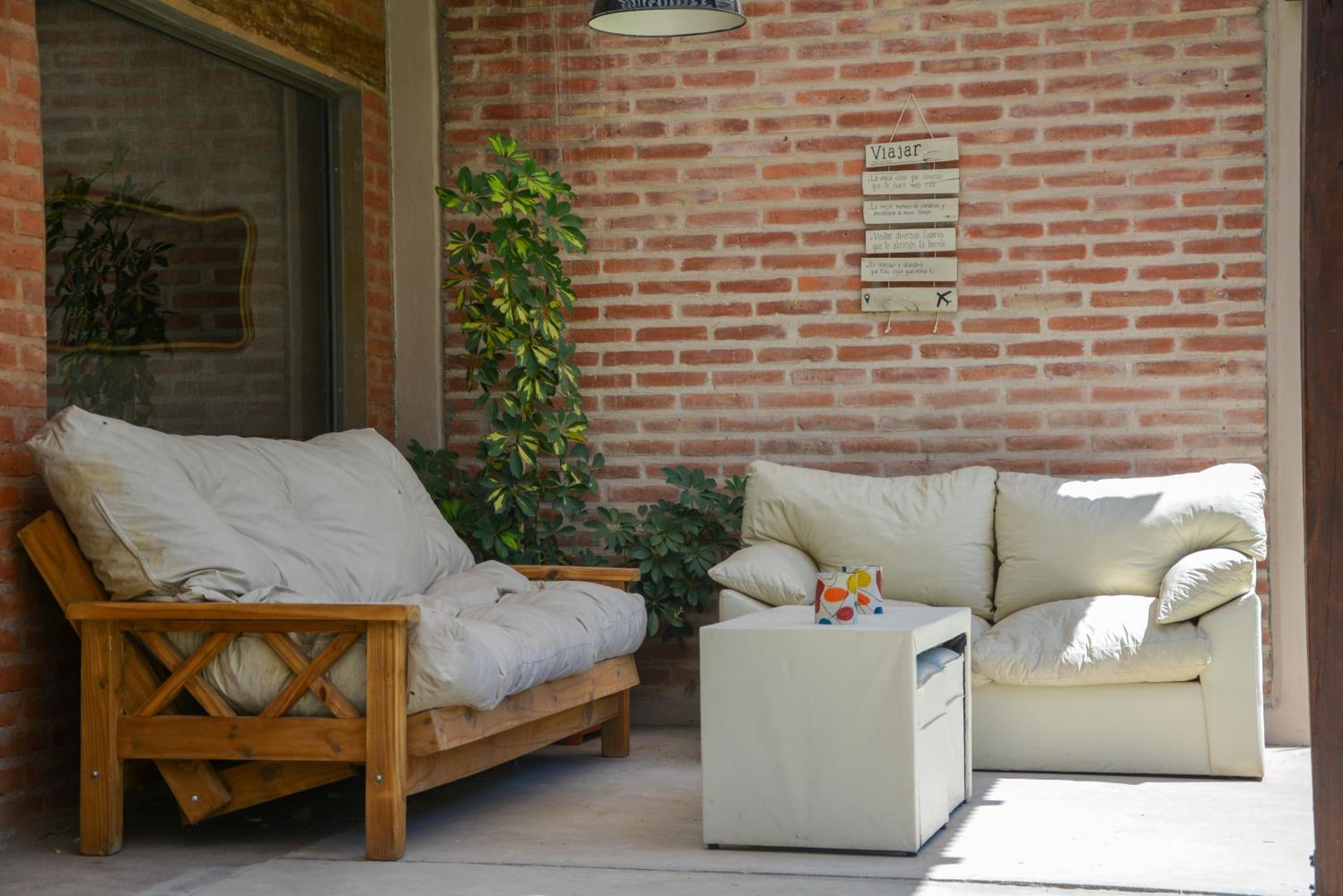 POSADA ROSSINA Habitaciones con baño privado y ambientes compartidos