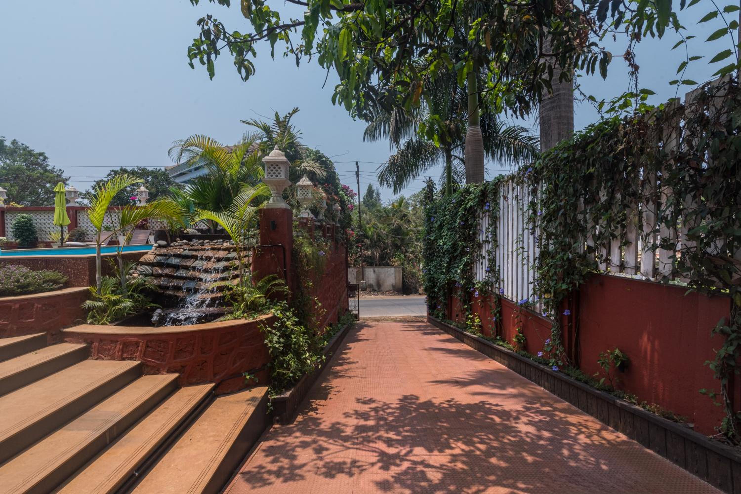 SaffronStays Chira-5BR heritage villa with laterite stone walls, verandah sit-outs & private pool view 5