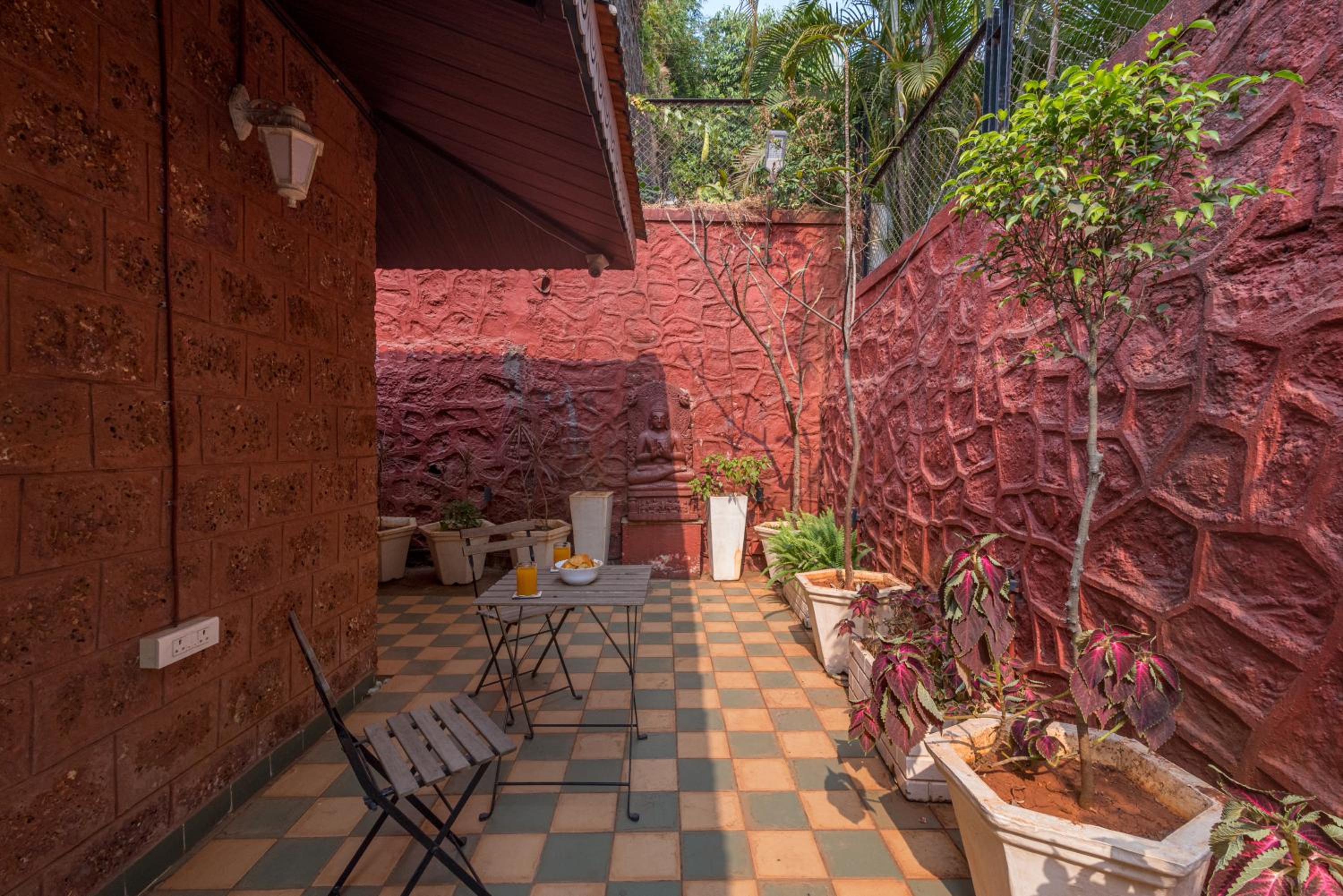 SaffronStays Chira-5BR heritage villa with laterite stone walls, verandah sit-outs & private pool view 4