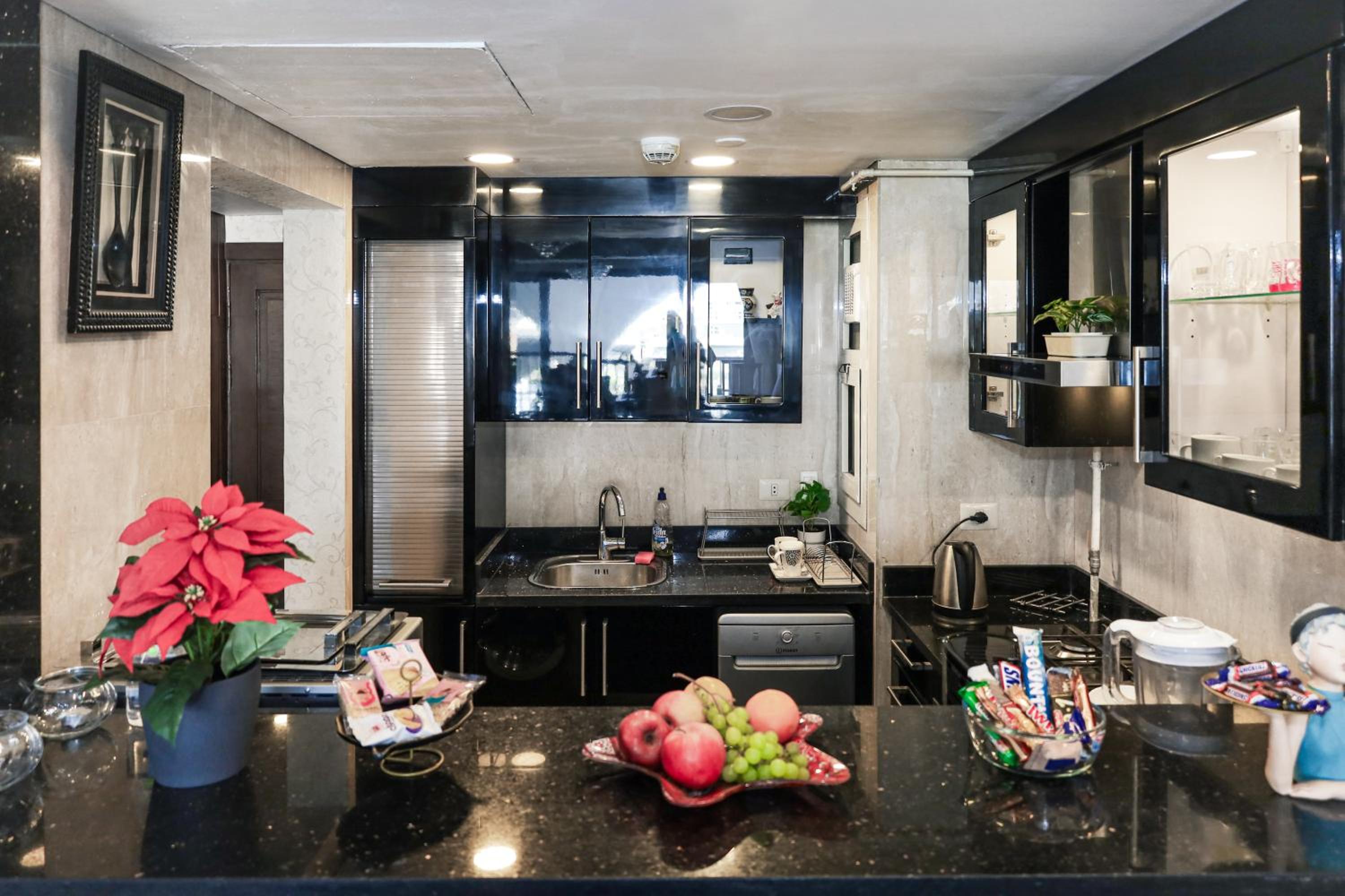 Luxury hotel apartment with pools in front AUC