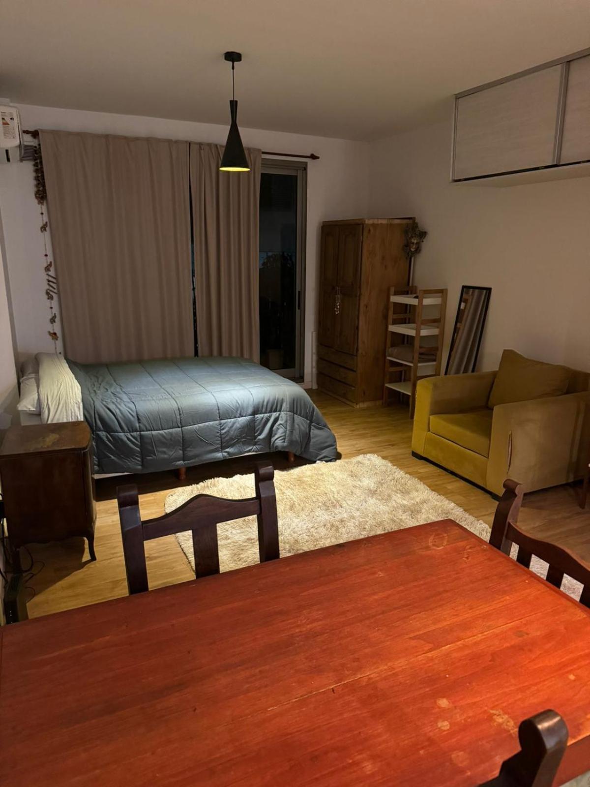 Apartment with balcony, garden and parrilla