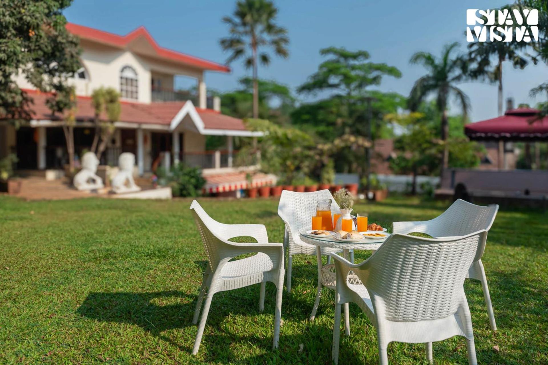 StayVista's Hillside Serenity - Hill-view villa with Outdoor pool, Bar, Spacious lawn, and Indoor & Outdoor activities view 3